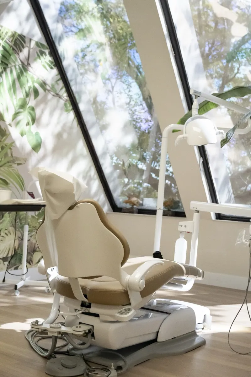 Bright dental operatory with a treatment chair and natural light